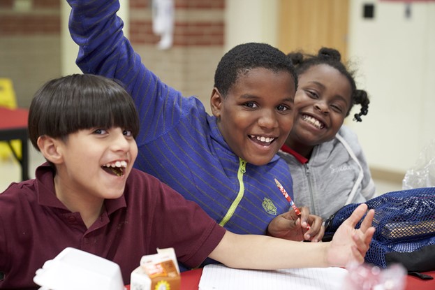 Three small Children Smiling Three small Children Smiling at School